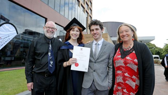 Bachelor of Arts graduate Naomi Thompson with her husband Brodie Thompson and proud parents David Dieckfoss and Merran Dieckfoss. Picture: PATRICK GEE