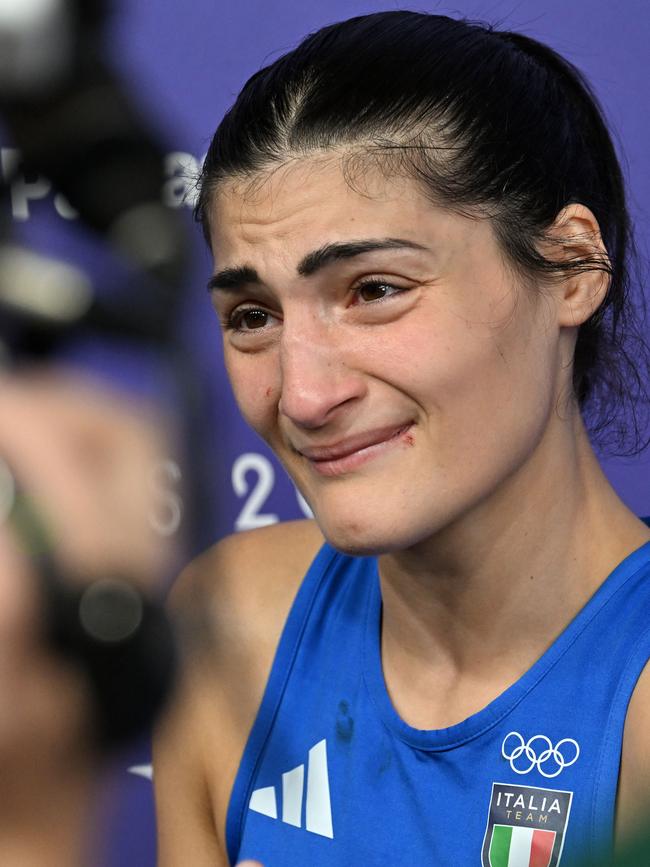 Angela Carini of Italy fights back tears after the match. Picture: Getty