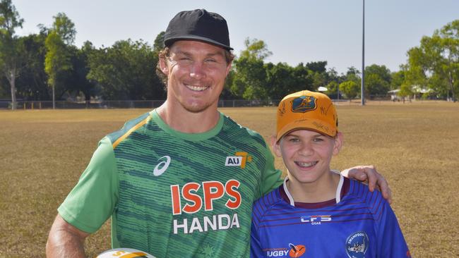 Former Wallabies captain turned 7s player Michael Hooper with NT rugby junior Clancy Nason. Picture: Darcy Jennings.