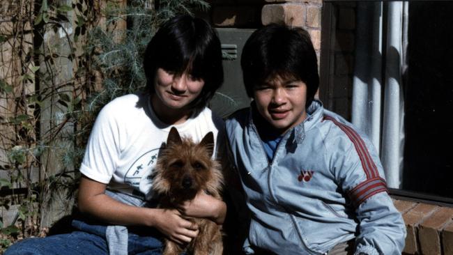 Senator Penny Wong with brother Toby and dog Pepe.