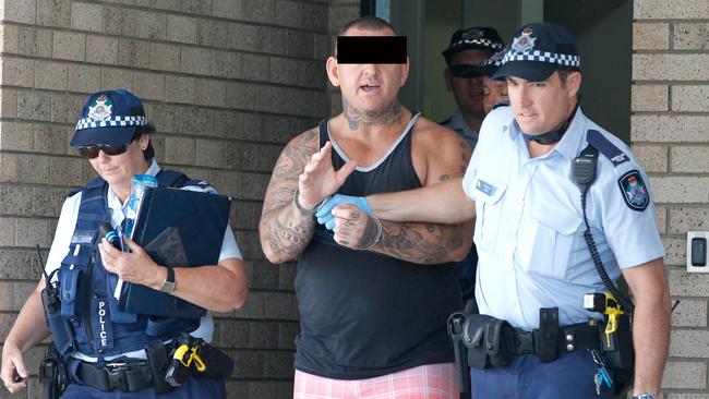 Despite the tough anti-bikie laws, criminal gang members are still regularly being arrested by police. This man was pictured at Palm Beach police station recently.