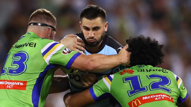 Sharks fullback Jack Bird takes on the Canberra Raiders line on Saturday night. Picture: Getty Images