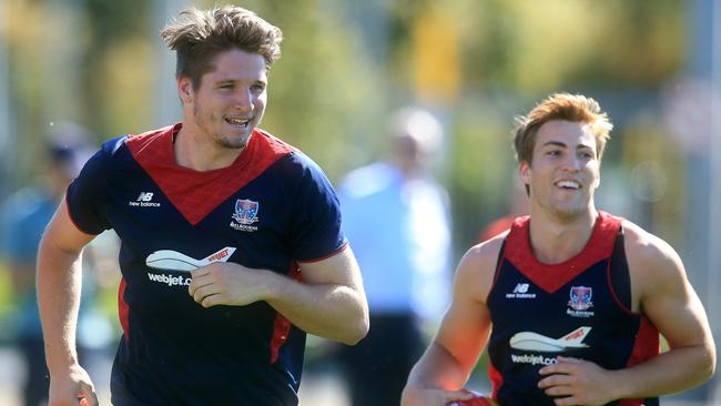 Jesse Hogan does laps with Jack Viney at pre-season training. Picture: Wayne Ludbey