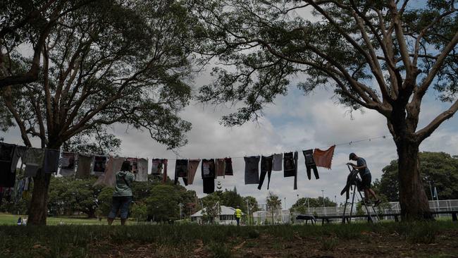 A clothing line in Prince Alfred Park of female apparel, to illustrate those taken hostage or killed by Hamas since October 7. Picture: Flavio Brancaleone