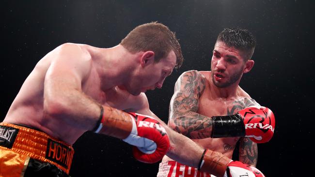 Michael Zerafa punches Jeff Horn during the middleweight bout at Brisbane Convention &amp; Exhibition Centre on December 18, 2019 in Brisbane, Australia. (Photo by Chris Hyde/Getty Images)