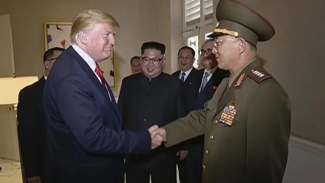 Donald Trump greets No Kwang Chol, minister of People’s Armed Forces of North Korea. Picture: AP
