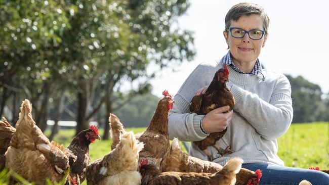 Cath Jenkins on her farm at South Purrumbete with her laying hens. Picture: Zoe Phillips