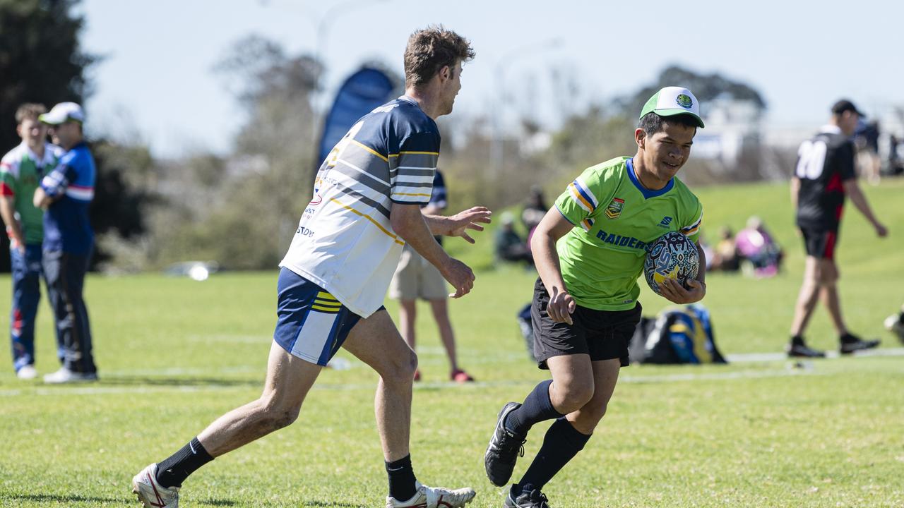 Prawit Payungwang (right) finds a gap in the Cowboys defence. Picture: Kevin Farmer