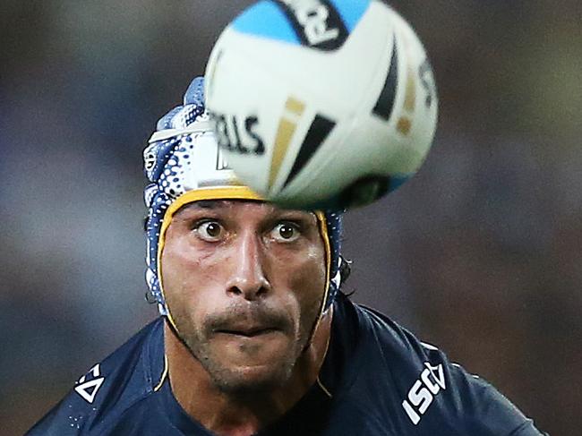 Cowboy's Johnathan Thurston chip kick during the 2015 NRL Grand Final between the Brisbane Broncos and North Queensland Cowboys at ANZ Stadium. Picture. Phil Hillyard