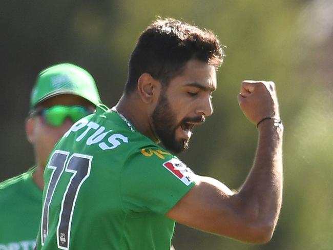 MELBOURNE, AUSTRALIA - DECEMBER 22: Haris Rauf of the Stars celebrates getting the wicket of Qais Ahmad of the Hurricanes during the Big Bash League match between the Melbourne Stars and the Hobart Hurricanes at Ted Summerton Reserve in Moe on December 22, 2019 in Melbourne, Australia. (Photo by Quinn Rooney/Getty Images)