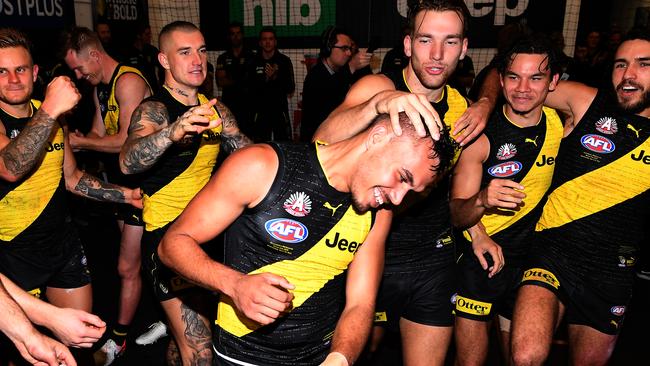 Sydney Stack celebrates his first win as a Richmond player. Picture: AAP Image/Julian Smith.