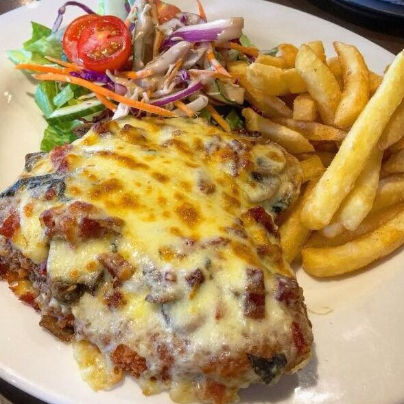 This popular eatery is known for its steaks, but its take on the classic pub parmi is hugely popular. Albany Creek Tavern. Picture: Albany Creek Tavern