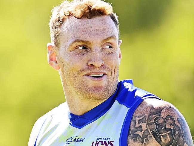 BRISBANE, AUSTRALIA - AUGUST 18: Mitch Robinson laughs during a Brisbane Lions AFL training session at Leyshon Park on August 18, 2020 in Brisbane, Australia. (Photo by Albert Perez/Getty Images)