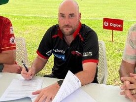 Chris Laffan signs as Vanuatu coach.