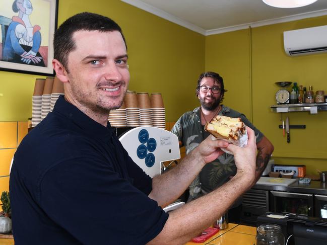 Co-owner Kurt Bartlett and barista Haakon Beyer.at Postie, a new, coffee shop/toastie place that’s just opened in the Darwin CBD. Picture: Katrina Bridgeford