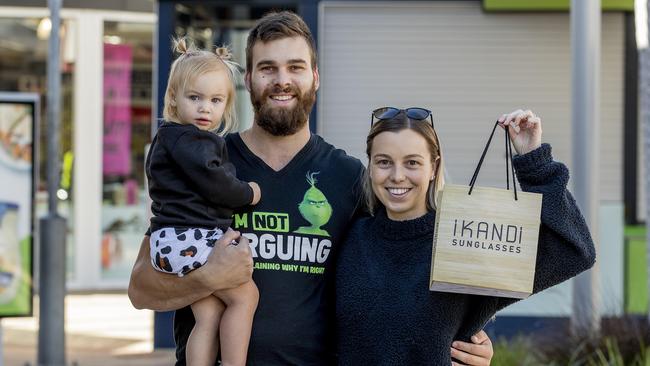 COVID-19 restrictions around shopping and go out in public have been relaxed. Shoppers Chloe Tucker, Lindsey Walker and Kilani Walker, 2, at Harbour Town Premium Outlets. Picture: Jerad Williams