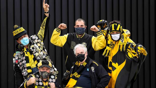 CSIRO workmates and passionate Richmond supporters Paul Clarke, Christian Katis, Joe Scibs, Michael Floros and Greg Blease. Picture: Ian Currie