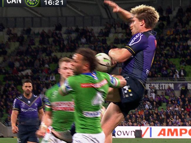 Cameron Munster tackled by Kris