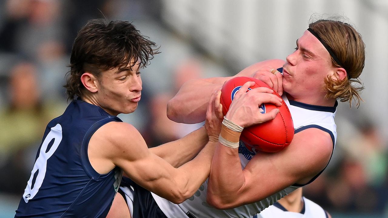 Harley Reid takes a powerful grab. Picture: Morgan Hancock/AFL Photos via Getty Images