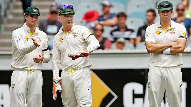 Cricket Boxing Day Test Day 5 at MCG, Steve Smith and Brad Haddin make field moves as Shane Watson looks on. Melbourne. 30th December 2014. Picture: Colleen Petch.