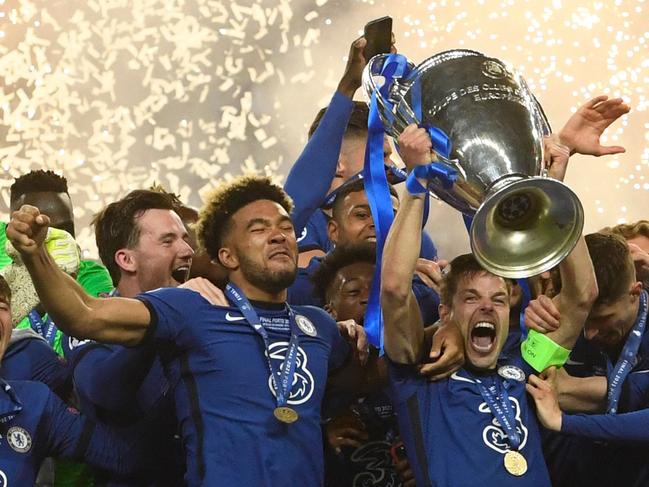 Chelsea’s Spanish defender Cesar Azpilicueta (right) celebrates with the trophy. Picture: AFP
