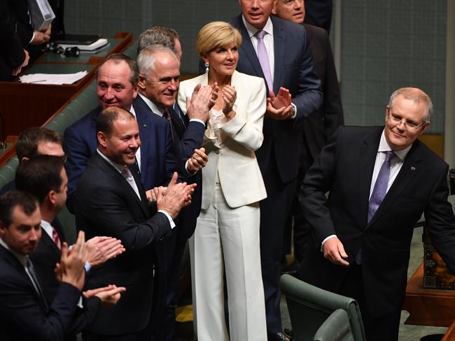 The Government frontbench applaud Australian Federal Treasurer Scott Morrison after delivering the 2017-18 Federal Budget. Picture: Mick Tsikas