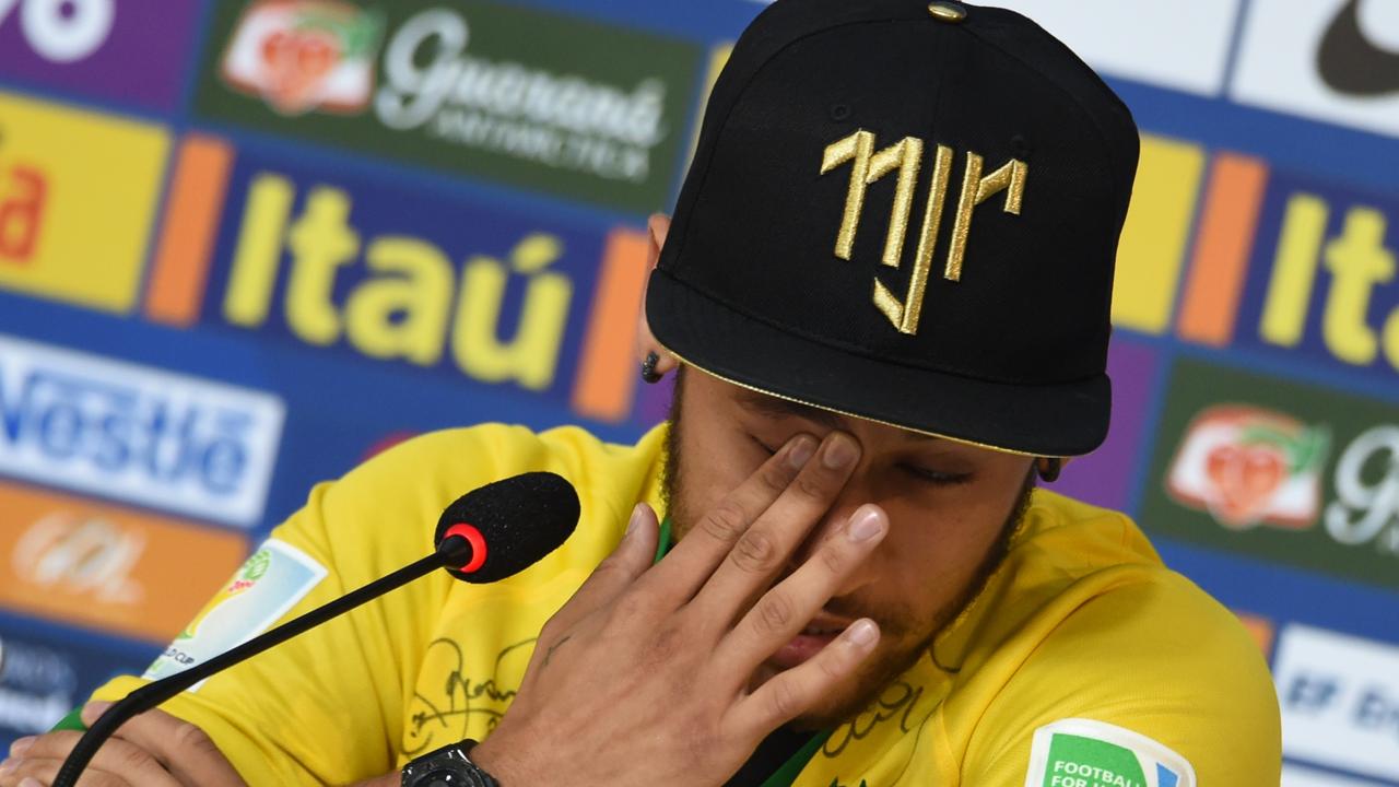 Brazil's forward Neymar gestures during a press conference in Teresopolis on July 10, 2014, during the FIFA World Cup. Brazil will face Netherlands on July 12, in the third place play-off for the FIFA World Cup tournament at The Mané Garrincha National Stadium in Brasilia. AFP PHOTO / VANDERLEI ALMEIDA