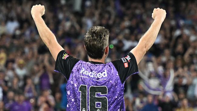 HOBART, AUSTRALIA - JANUARY 27: Mitch Owen of the Hurricanes celebrates the win with fans during the BBL The Final match between Hobart Hurricanes and Sydney Thunder at Ninja Stadium on January 27, 2025 in Hobart, Australia. (Photo by Steve Bell/Getty Images)