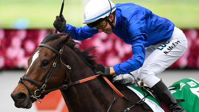 Kerrin McEvoy salutes after Trekking’s win in the Stradbroke Handicap. Picture: AAP