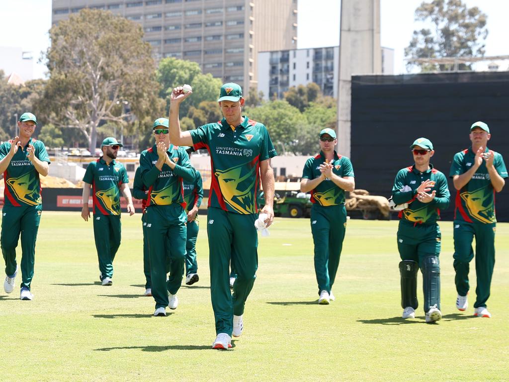 Beau Webster of Tasmania raises the ball aloft after claiming six wickets in the innings. Picture: Getty Images