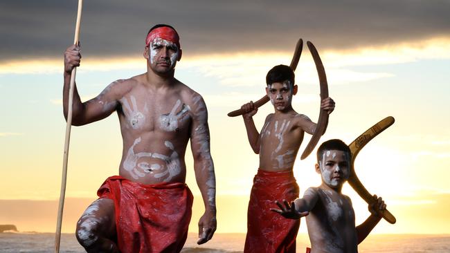 Fiercely proud of his heritage, Walker poses with sons Kian and Kade during the Indigenous Round last season.