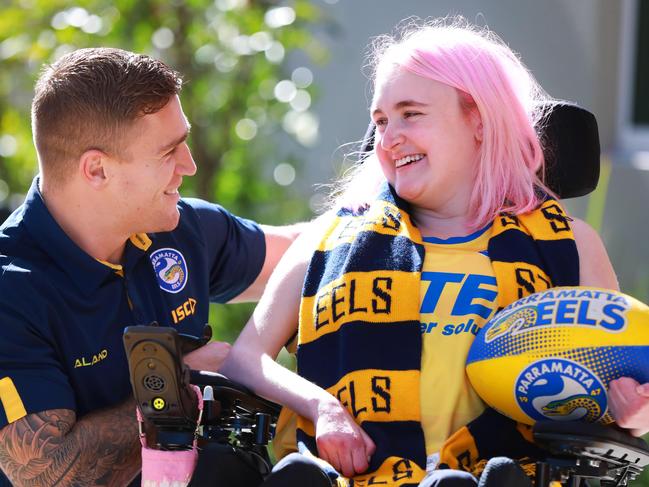 Parramatta Eels player Cameron King meets Northcott clients Ash McDonald (27) Cameron is an ambassador for Northcott and visits the disability service provider for DoSomething Day 2018. Parramatta, Wednesday, July 25th 2018. Parramatta Eels hooker Cameron King is an ambassador for Northcott- a disability service provider. (AAP Image / Angelo Velardo)