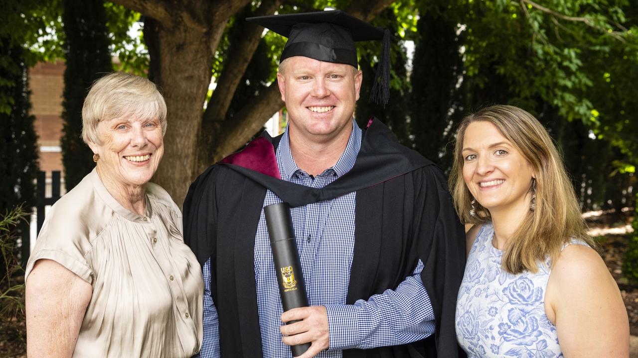 Bachelor of Spatial Science Technology (Surveying) graduate Benjamin Cole with Muriel Cole (left) and Chloe Jackson at the UniSQ graduation ceremony at Empire Theatres, Tuesday, December 13, 2022. Picture: Kevin Farmer