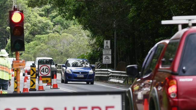 The Kuranda River bridge on the Kennedy Highway is now operating as a single lane, with road traffic controllers operating traffic lights from 9am to 3pm, as RoadTek engineers check the structural integrity of the roadworks carried out last year under the bridge. Picture: Brendan Radke