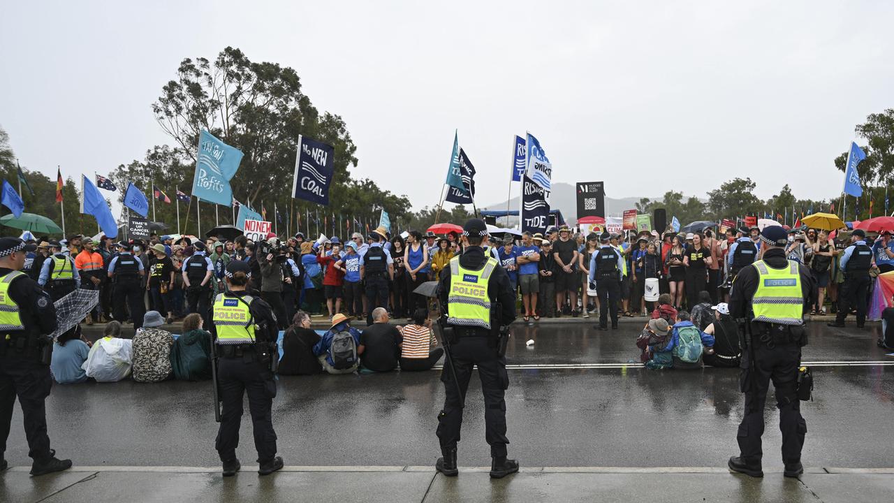 They were met with a wall of federal officers guarding the nation’s legislature. Picture: NewsWire / Martin Ollman