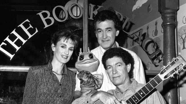 The Book Place presenters Lynn Weston, Brenton Whittle and Andy Armstrong with Bookworm in 1992.