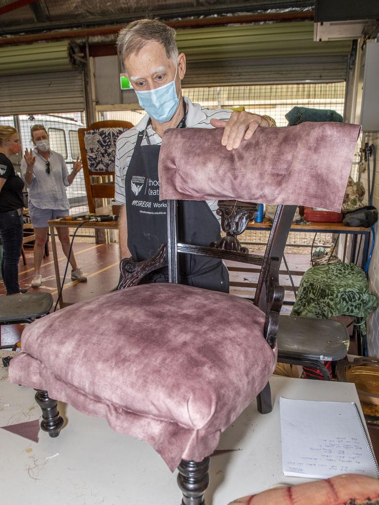 Peter Evan with a late 1800s salon chair. Furniture upholstery and restoration class with Deka Design. McGregor Summer School at USQ. Friday, January 14, 2022. Picture: Nev Madsen.