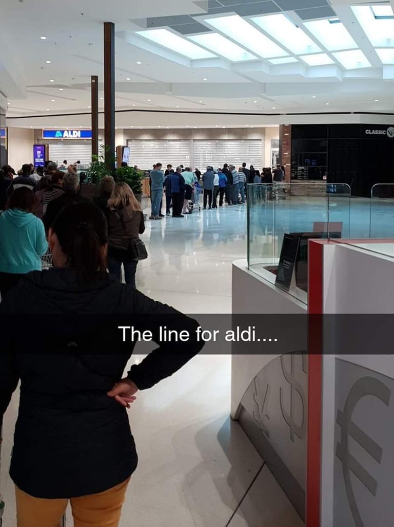 As panic buyers queue to get inside Aldi and buy supplies, shoppers have reported seeing some using “’un-Australian’ tactics to get past the buying limits. Picture: Facebook