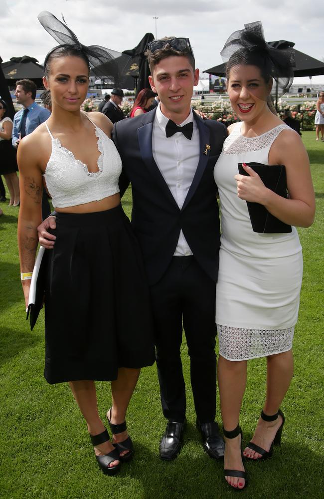 Tayla Rappolt, Adrian Marasea and Tayla Fenech on Victoria Derby Day at Flemington Racecourse on Saturday, November 1, 2014, in Flemington, Australia. Picture: Hamish Blair