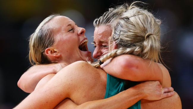 SYDNEY, AUSTRALIA - AUGUST 16: (L-R) Renae Hallinan, Laura Geitz and Julie Corletto of the Diamonds celebrate victory in the 2015 Netball World Cup Gold Medal match between Australia and New Zealand at Allphones Arena on August 16, 2015 in Sydney, Australia. (Photo by Matt King/Getty Images)