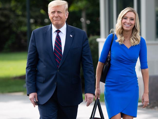 Then-US President Donald Trump and White House Press Secretary Kayleigh McEnany on the South Lawn of the White House in Washington, DC in September 2020. Picture: AFP.