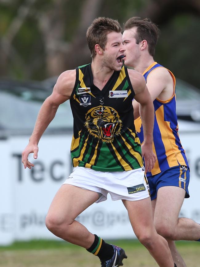 Sam Geurts celebrates after a goal for Dromana. Picture: David Crosling