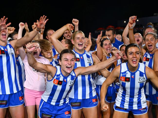 MELBOURNE, AUSTRALIA - NOVEMBER 30: Kangaroos celebrate victory during the AFLW Grand Final match between North Melbourne Tasmanian Kangaroos and Brisbane Lions at Ikon Park, on November 30, 2024, in Melbourne, Australia. (Photo by Quinn Rooney/Getty Images)