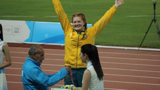 Alex Hulley is jubilant as she receives her silver medal in Nanjing.