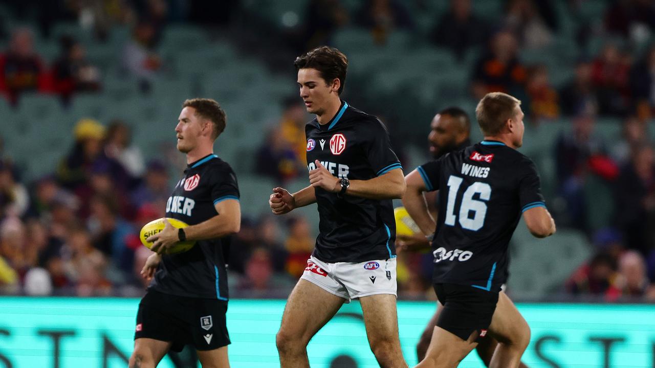 Connor Rozee of the Power warms up. (Photo by Sarah Reed/AFL Photos via Getty Images)