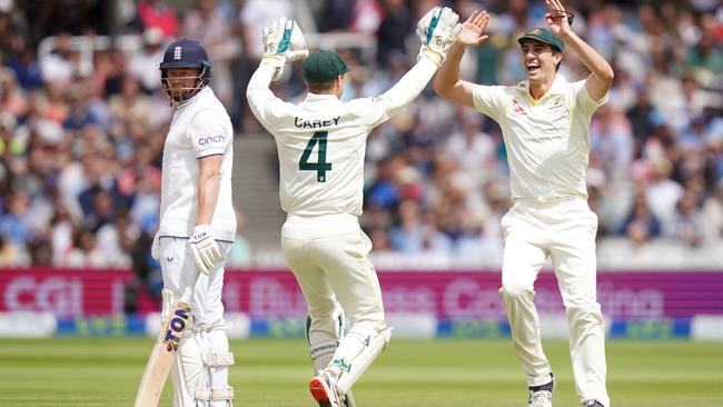 Pat Cummins celebrates with Alex Carey after the stumping of Jonny Bairstow at Lord’s. Picture: Adam Davy/PA Images via Getty Images