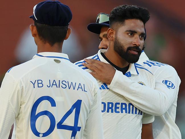 ADELAIDE, AUSTRALIA - DECEMBER 07: Mohammed Siraj of India celebrates with teammates after dismissing Mitchell Starc of Australia during day two of the Men's Test Match series between Australia and India at Adelaide Oval on December 07, 2024 in Adelaide, Australia. (Photo by Robert Cianflone/Getty Images)