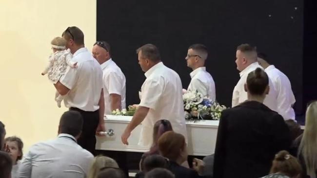 Marc and friends carried Sarah's casket out of the centre.