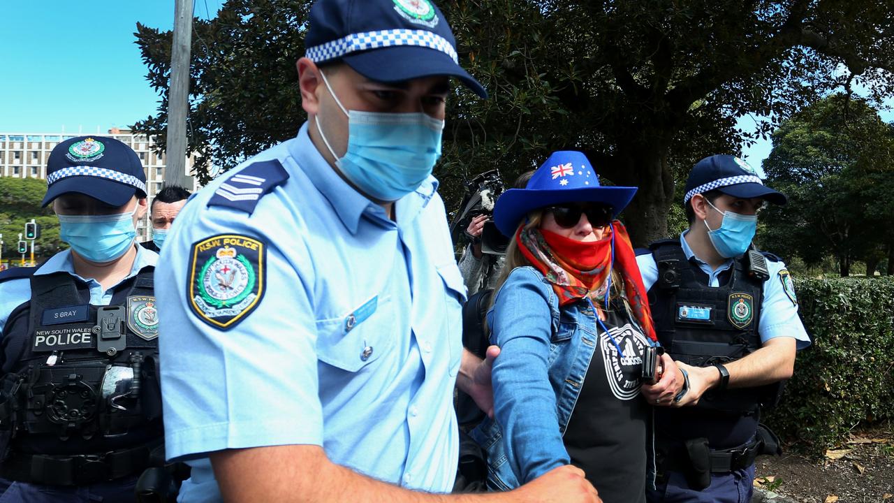 Police were quick to apprehend protesters in Sydney, who still came out despite warnings they risk being arrested and thousands of dollars in fines. Picture: Lisa Maree Williams/Getty Images.