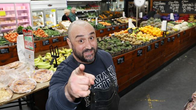 John Kapiris inside his St Bernards Fruit and vegetable store in Adelaide. His videos about supermarkets price gouging customers have gone viral in the past. Picture: NCA NewsWire / David Mariuz